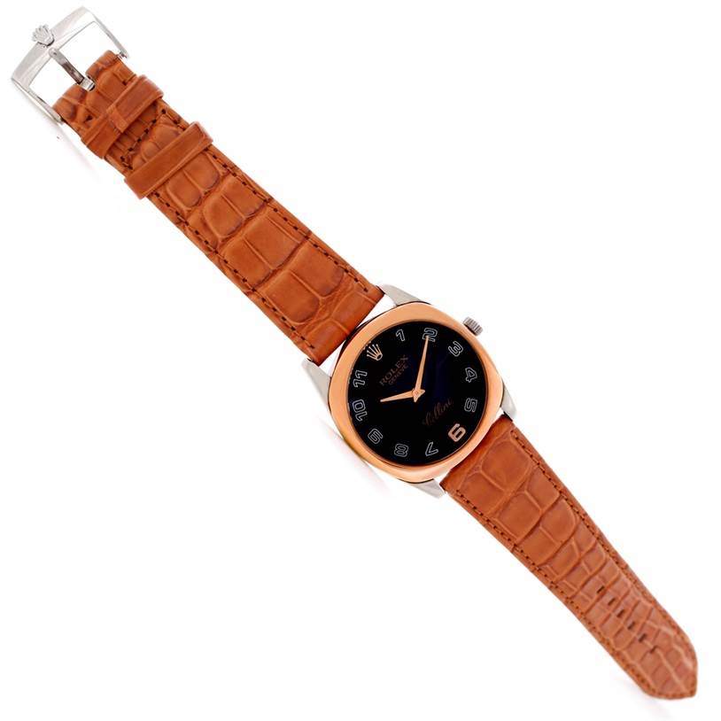 The image shows a top-down view of a Rolex Cellini 4233 Men's White Gold Black Dial 4233 Men's White Gold Black Dial watch, including the face, bezel, and brown leather strap.