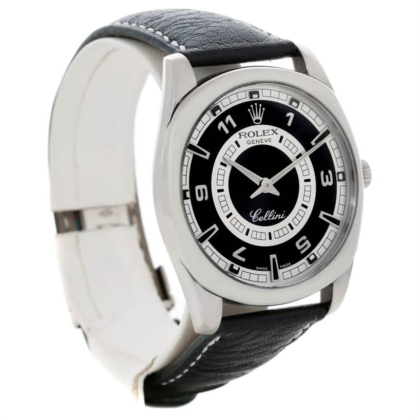 The image shows a front and slightly angled view of the Rolex Cellini 4243 Men's White Gold Black Dial 4243 Men's White Gold Black Dial watch, highlighting its black dial, numerals, and leather strap.