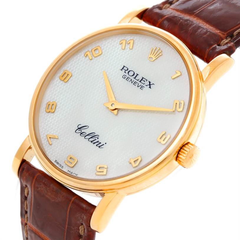 This image shows a close-up, angled view of a Rolex Cellini 5115 Men's Yellow Gold Mother of Pearl Dial 5115 Men's Yellow Gold Mother of Pearl Dial watch, highlighting the dial, crown, and part of the leather strap.