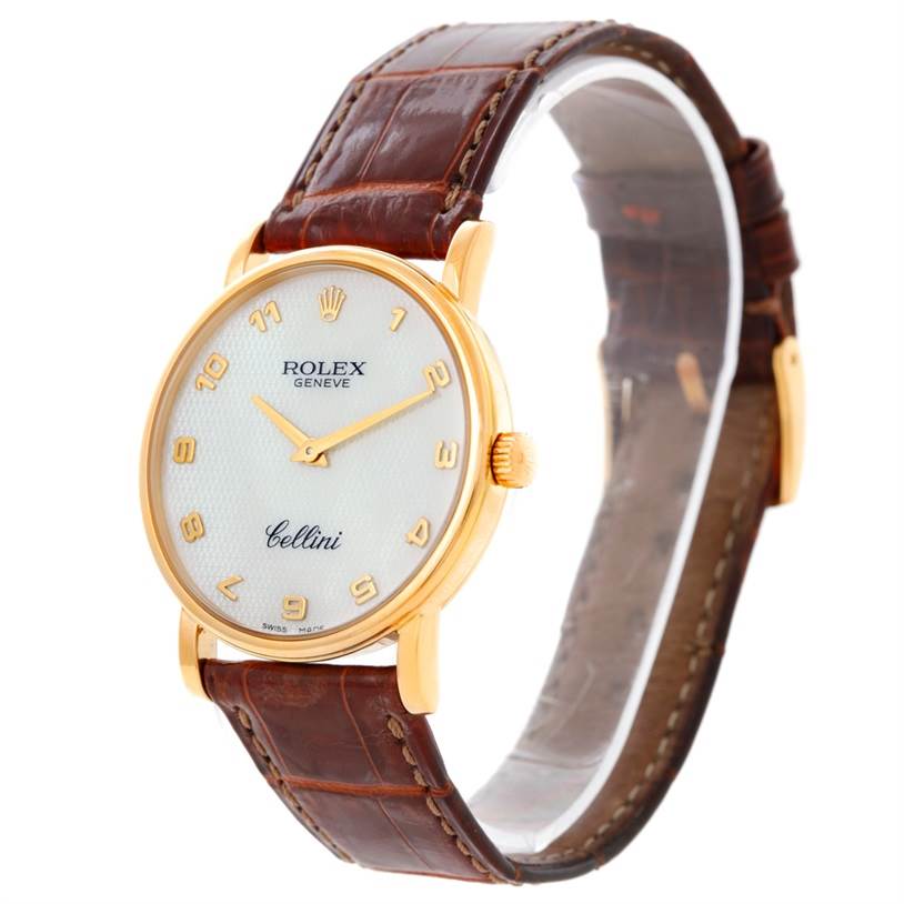 The Rolex Cellini 5115 Men's Yellow Gold Mother of Pearl Dial 5115 Men's Yellow Gold Mother of Pearl Dial watch is shown at a three-quarter angle, displaying its dial, crown, case, and leather strap.