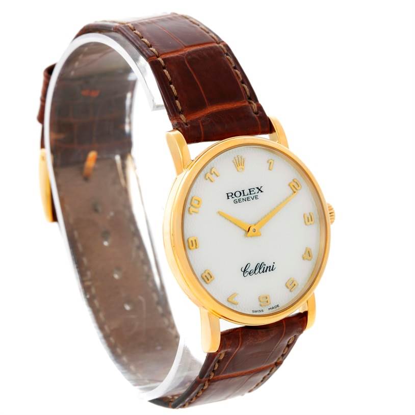 The image shows a Rolex Cellini 5115 Men's Yellow Gold Mother of Pearl Dial 5115 Men's Yellow Gold Mother of Pearl Dial watch at a slightly tilted angle, displaying its face, leather strap, and gold casing.