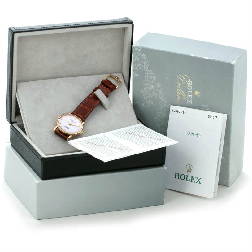 The image shows a Rolex Cellini 5115 Men's Yellow Gold Mother of Pearl Dial 5115 Men's Yellow Gold Mother of Pearl Dial watch angled in its box, accompanied by warranty papers and the outer packaging.
