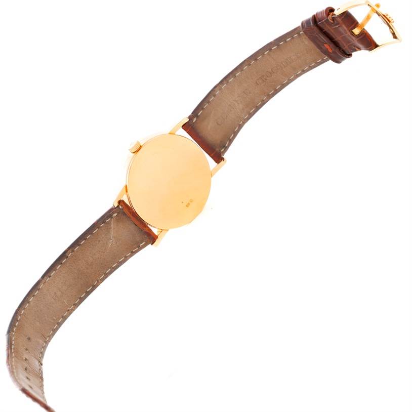 The image shows the back and leather strap of a Rolex Cellini 5115 Men's Yellow Gold Mother of Pearl Dial 5115 Men's Yellow Gold Mother of Pearl Dial watch at an angled view.