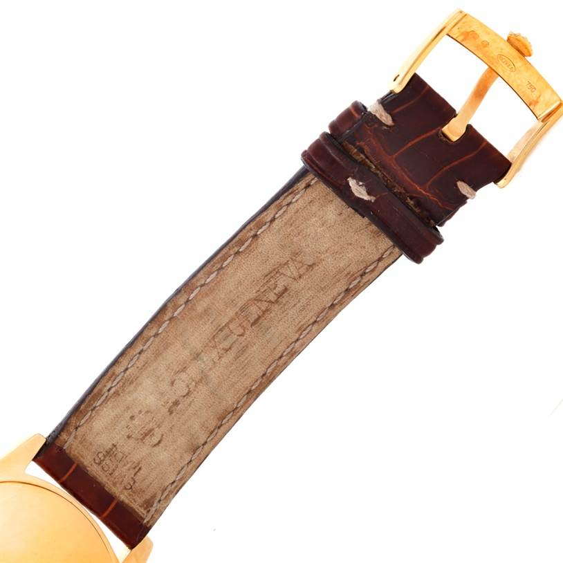 This image shows the strap and buckle of a Rolex Cellini 4233 Men's Yellow Gold Black Dial 4233 Men's Yellow Gold Black Dial watch from a partial top-down angle.