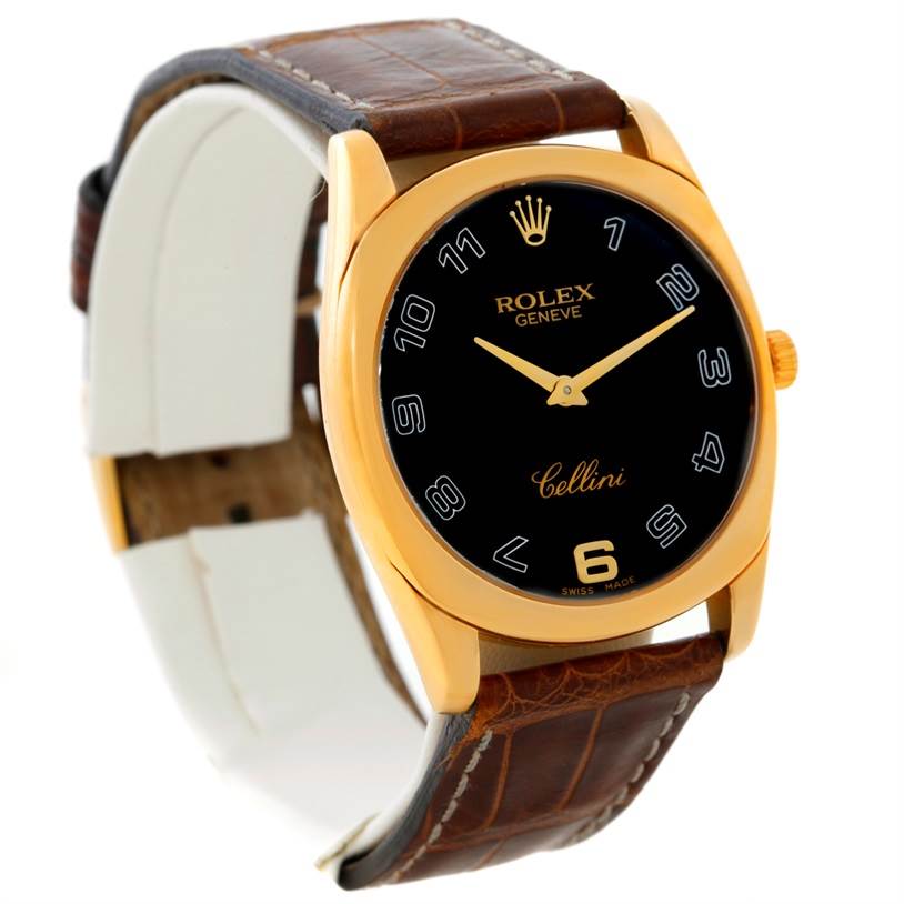 The Rolex Cellini 4233 Men's Yellow Gold Black Dial 4233 Men's Yellow Gold Black Dial watch is shown at a slight angle, displaying its face, bezel, crown, and leather strap.