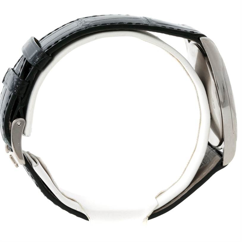 Side view of a Rolex Cellini 4233 Men's White Gold Black Dial 4233 Men's White Gold Black Dial watch showing the strap, clasp, and case.