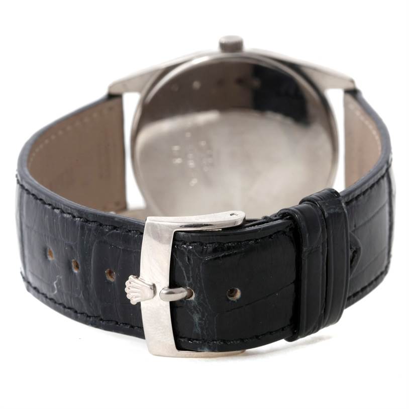 The image shows the back view of a Rolex Cellini 4233 Men's White Gold Black Dial 4233 Men's White Gold Black Dial watch, highlighting the leather strap and buckle.