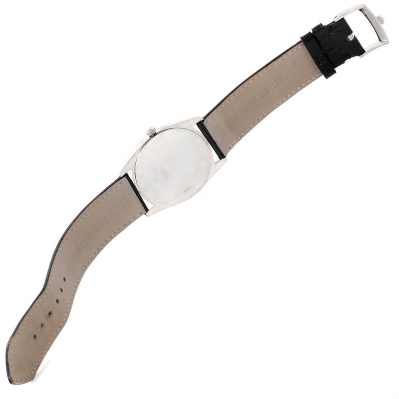 The image shows the back view of a Rolex Cellini 4233 Men's White Gold Black Dial 4233 Men's White Gold Black Dial model watch, emphasizing its rear case and leather strap.