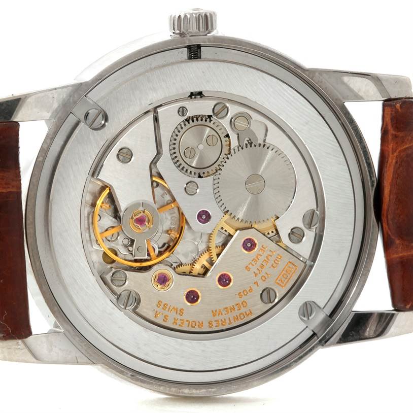 This image shows the back of the Rolex Cellini 5116 Men's White Gold Black Dial 5116 Men's White Gold Black Dial watch, highlighting its internal mechanical movement.