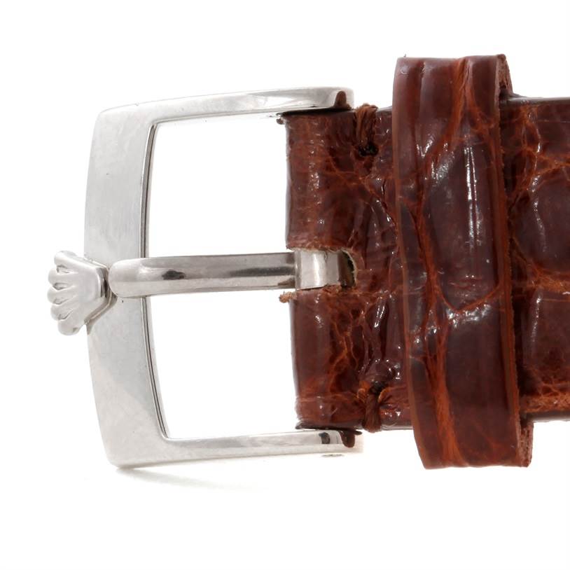 The image shows a close-up of a leather strap and buckle of the Rolex Cellini 5116 Men's White Gold Black Dial 5116 Men's White Gold Black Dial watch.