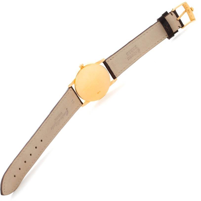 The image shows the back and strap of a Rolex Cellini 5116 Men's Yellow Gold Grey Dial 5116 Men's Yellow Gold Grey Dial watch at an oblique angle.