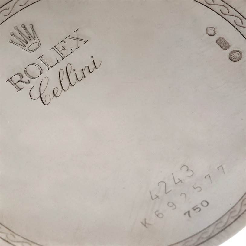 Close-up of the back case of a Rolex Cellini 4243 Men's White Gold Black Dial 4243 Men's White Gold Black Dial watch, showing model markings and serial numbers.