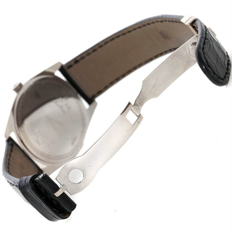 This image shows the Rolex Cellini 4243 Men's White Gold Black Dial 4243 Men's White Gold Black Dial watch from a rear angle, focusing on the opened strap and clasp mechanism.