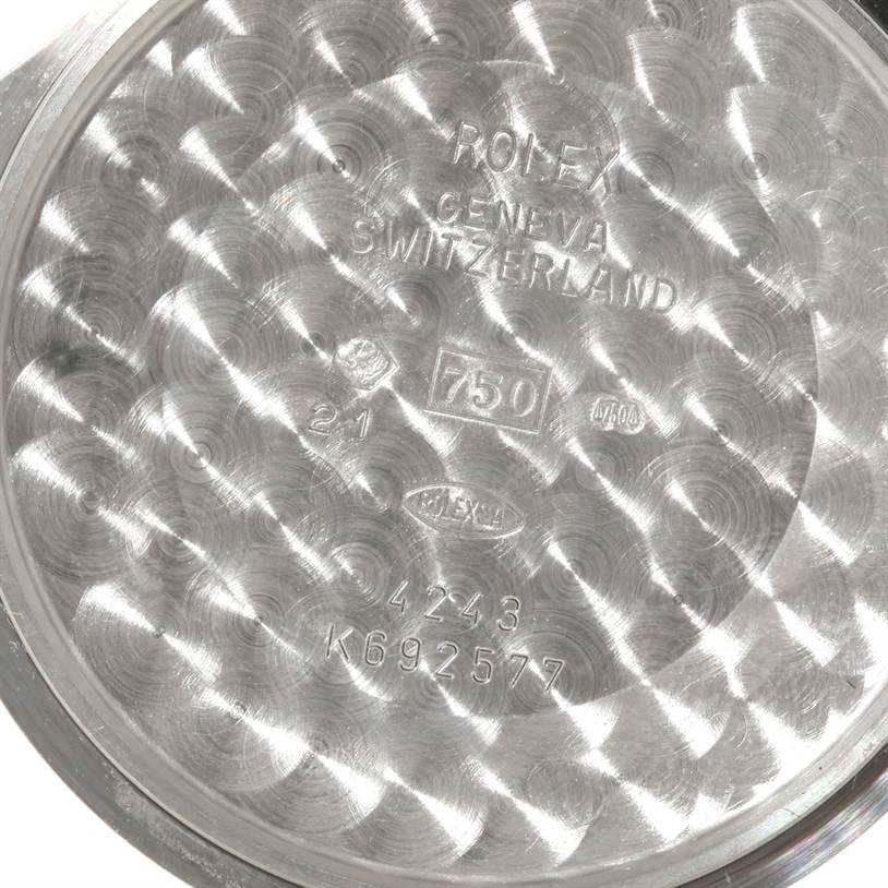 This image shows the interior case back of a Rolex Cellini 4243 Men's White Gold Black Dial 4243 Men's White Gold Black Dial watch, displaying its engravings and markings.