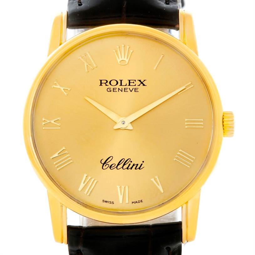 The image shows a front view of a Rolex Cellini 5116 Men
s Yellow Gold Champagne Dial 5116 Men
s Yellow Gold Champagne Dial watch, displaying its dial, bezel, and part of the strap.