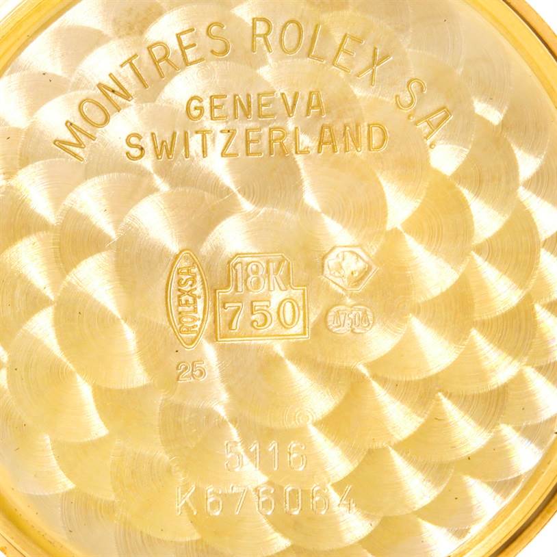 The image shows an engraving on the back case of a Rolex Cellini 5116 Men
s Yellow Gold Champagne Dial 5116 Men
s Yellow Gold Champagne Dial watch, displaying the model and material details.
