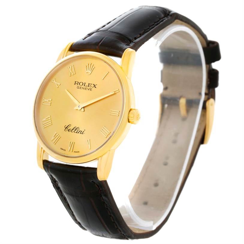 The image shows a Rolex Cellini 5116 Men
s Yellow Gold Champagne Dial 5116 Men
s Yellow Gold Champagne Dial model watch at a three-quarter angle, displaying the dial, case, crown, and leather strap.