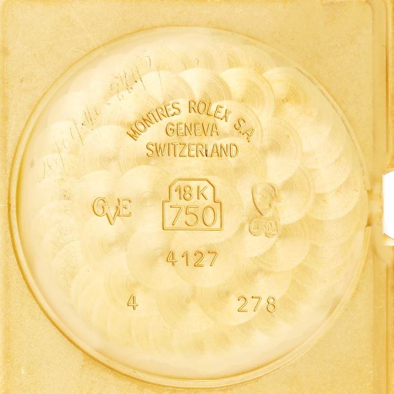 The image shows the inner case back of a Rolex Cellini 4127 Men's Yellow Gold Brown Dial 4127 Men's Yellow Gold Brown Dial watch, indicating 18K gold and other manufacturing details.