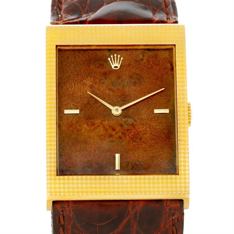 This image shows a front view of a Rolex Cellini 4127 Men's Yellow Gold Brown Dial 4127 Men's Yellow Gold Brown Dial watch, highlighting its square case, textured gold bezel, and brown leather strap.