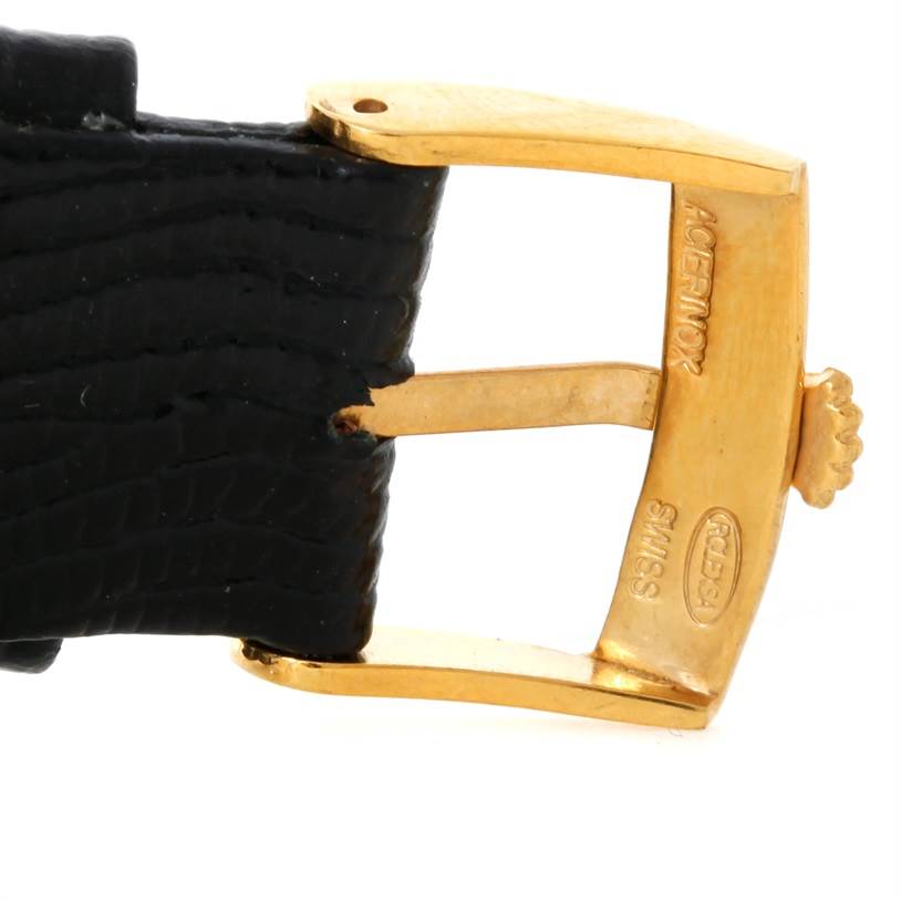 This image shows the buckle and strap of a Rolex Cellini 3833 Men
s Yellow Gold Champagne Dial 3833 Men
s Yellow Gold Champagne Dial watch from a close-up angle.