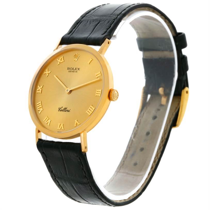 The image shows a Rolex Cellini 4112 Men
s Yellow Gold Champagne Dial 4112 Men
s Yellow Gold Champagne Dial watch at a slight angle, highlighting the gold dial, Roman numerals, and black leather strap.