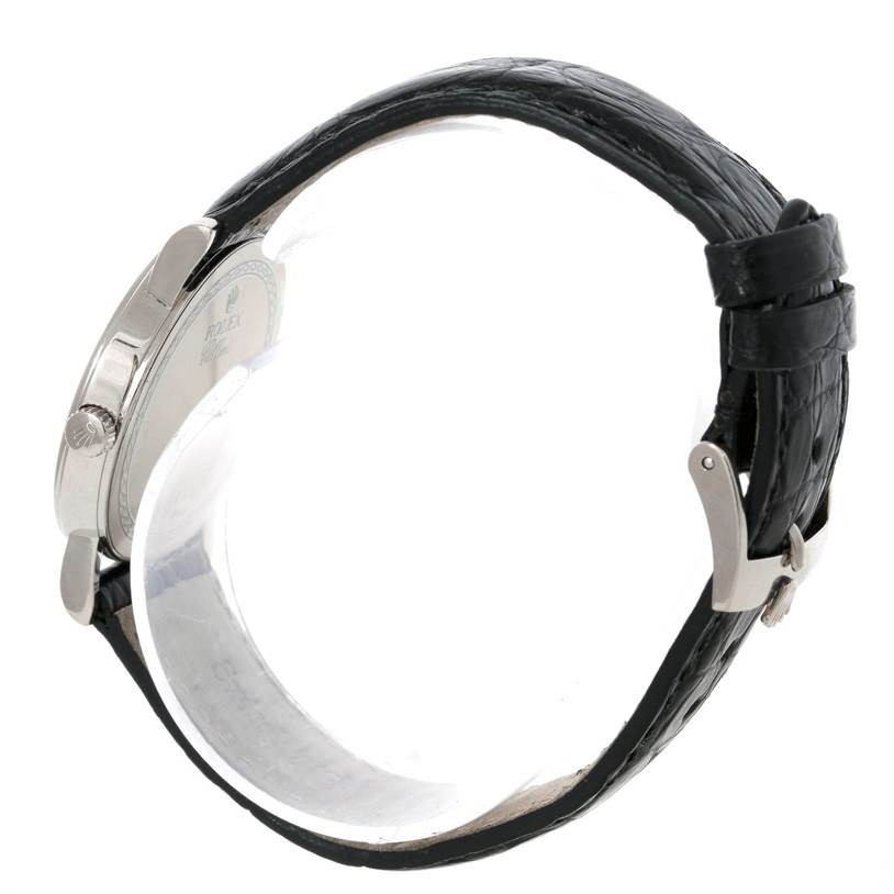 This image shows a side view of the Rolex Cellini 5116 Men's White Gold Silver Dial 5116 Men's White Gold Silver Dial watch, featuring the case back, crown, and black leather strap with buckle.