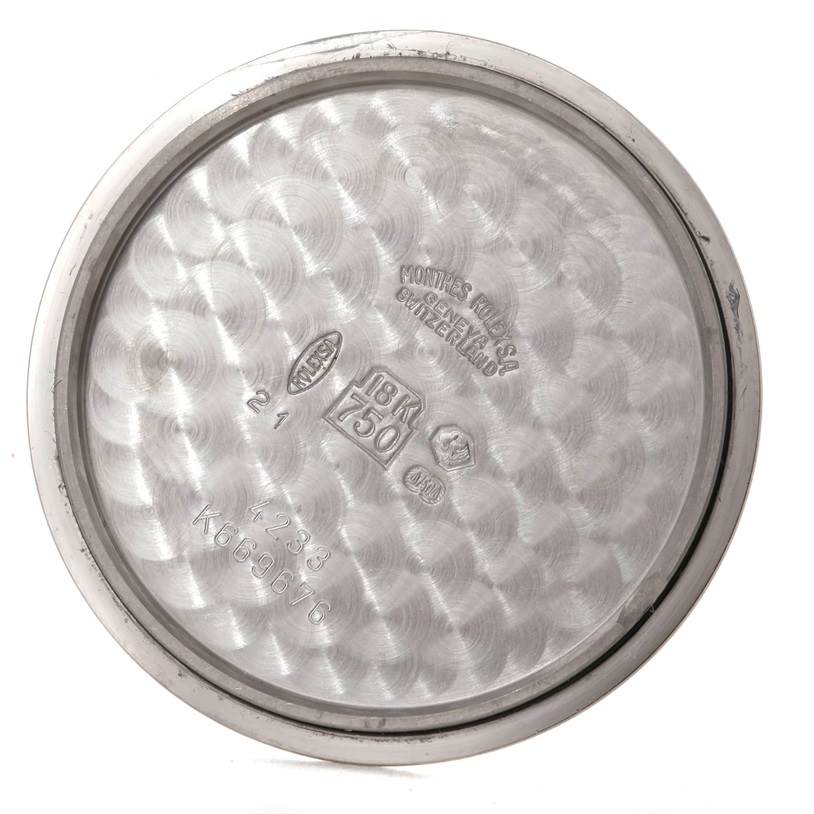 This is a close-up of the inner back case of a Rolex Cellini 4233 Men's White Gold White Dial 4233 Men's White Gold White Dial watch showing the stamped markings and material details.