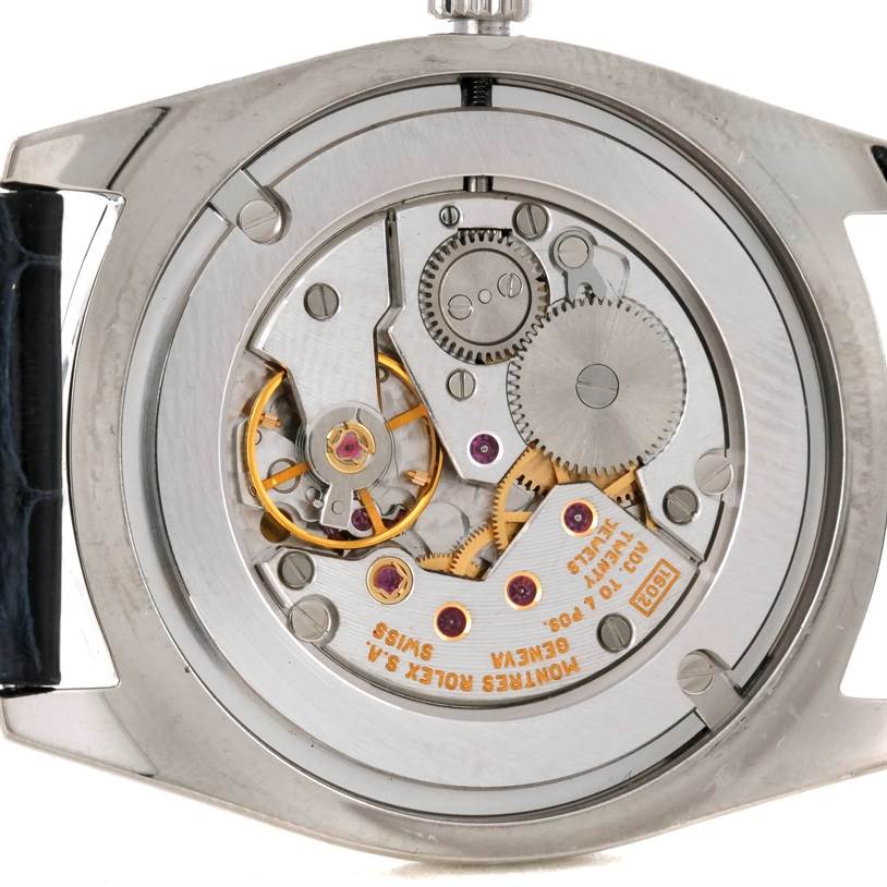 This image shows the intricate internal components and gears of a Rolex Cellini 4233 Men's White Gold White Dial 4233 Men's White Gold White Dial watch viewed from the back.