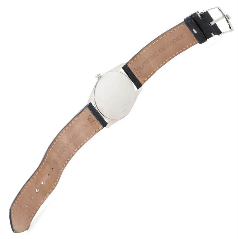 This image shows the back and straps of a Rolex Cellini 4233 Men's White Gold White Dial 4233 Men's White Gold White Dial watch from a top-down angle.