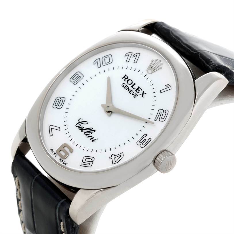 The watch, a Rolex Cellini 4233 Men's White Gold White Dial 4233 Men's White Gold White Dial model, is shown from an angled perspective, showcasing the face, hands, bezel, crown, and leather strap.