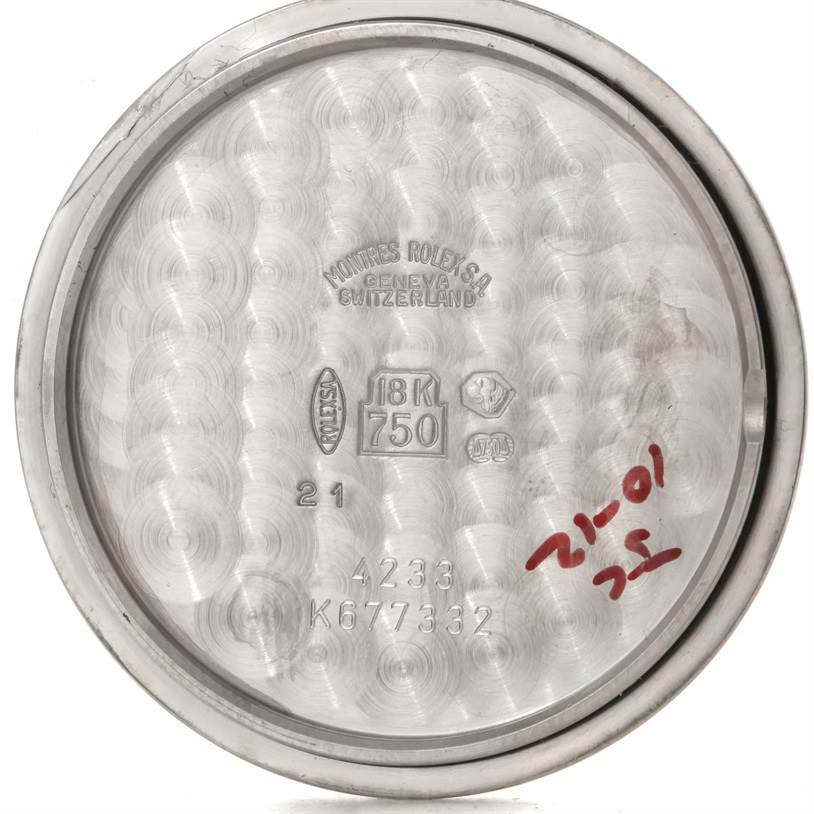 This image shows the inside case back of a Rolex Cellini 4233 Men's White Gold White Dial 4233 Men's White Gold White Dial watch, displaying hallmarks and inscriptions.