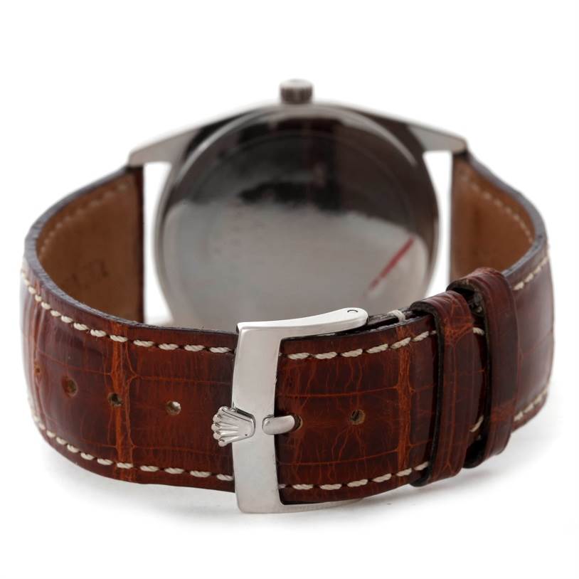 This image shows the back of the Rolex Cellini 4233 Men's White Gold White Dial 4233 Men's White Gold White Dial watch, focusing on the leather strap and buckle.