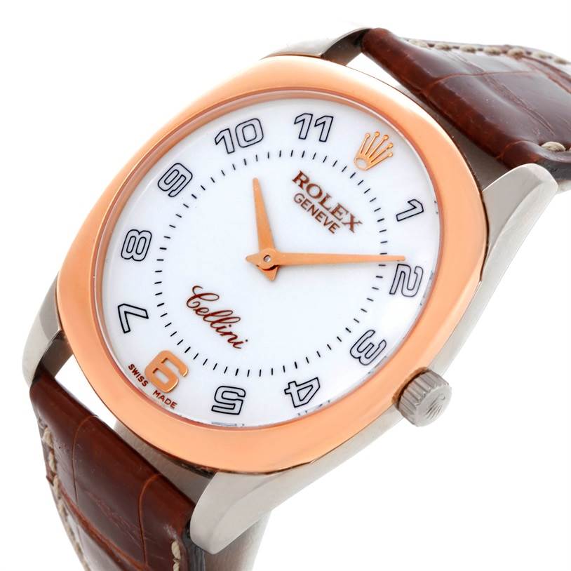 The Rolex Cellini 4233 Men's White Gold White Dial 4233 Men's White Gold White Dial watch is shown at a tilted angle, displaying its dial, crown, and part of its brown leather strap.