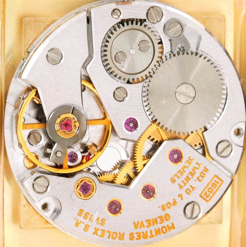 This image shows a close-up of the internal movement mechanism of a Rolex Cellini 4126 Men's Yellow Gold Champagne Dial 4126 Men's Yellow Gold Champagne Dial model watch.