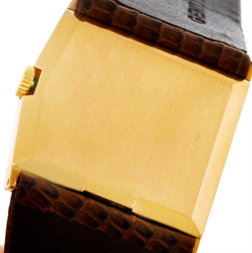 The image shows the side and part of the back of the Rolex Cellini 4126 Men's Yellow Gold Champagne Dial 4126 Men's Yellow Gold Champagne Dial watch, including the crown and leather strap.