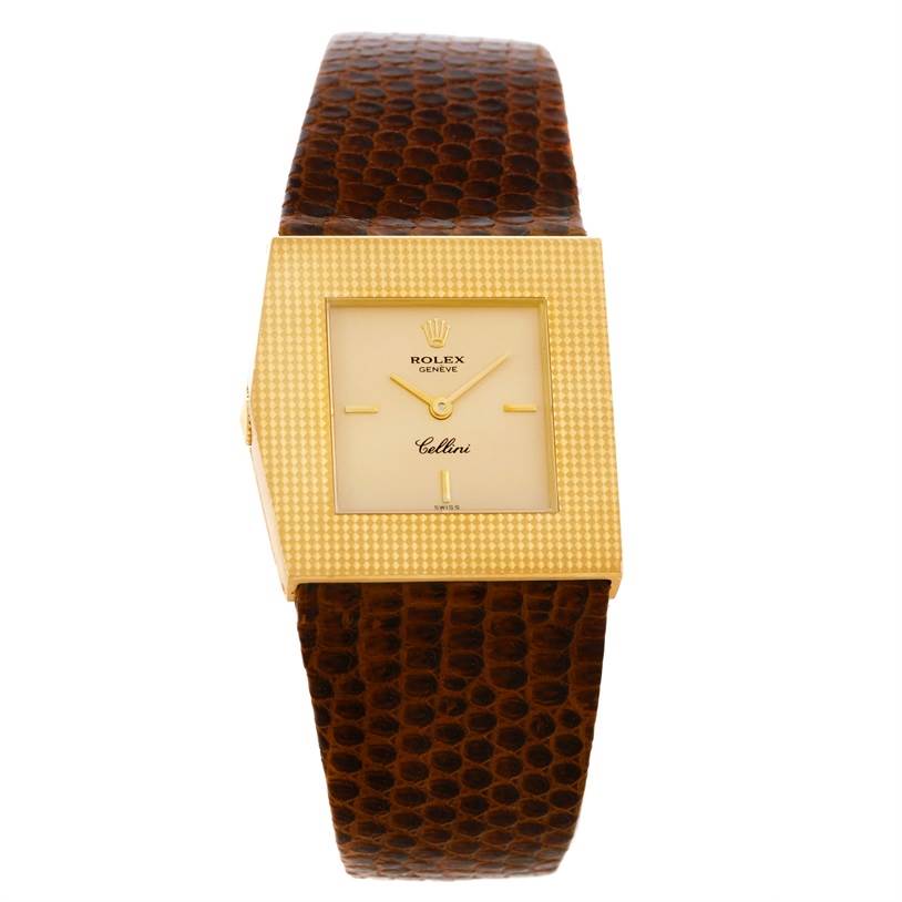 The Rolex Cellini 4126 Men's Yellow Gold Champagne Dial 4126 Men's Yellow Gold Champagne Dial watch is shown from the front, displaying its square gold face and brown textured leather strap.