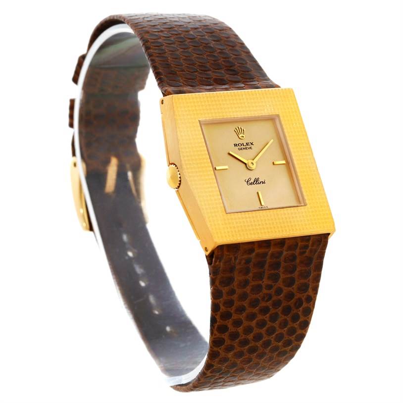 This image shows a side view of the Rolex Cellini 4126 Men's Yellow Gold Champagne Dial 4126 Men's Yellow Gold Champagne Dial watch with a square gold case and a brown textured leather strap.