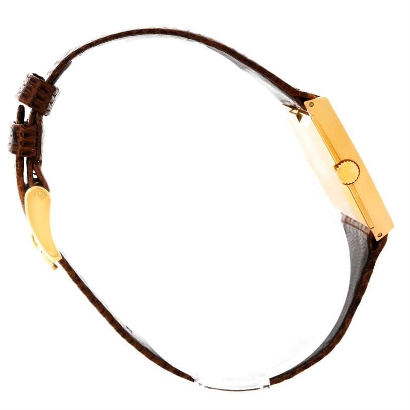 The image shows the side view of the Rolex Cellini 4126 Men's Yellow Gold Champagne Dial 4126 Men's Yellow Gold Champagne Dial watch, highlighting the case, crown, and leather strap.