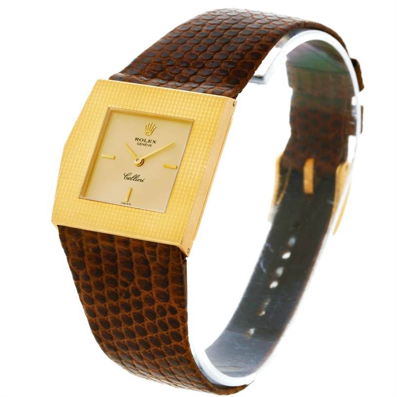 The Rolex Cellini 4126 Men's Yellow Gold Champagne Dial 4126 Men's Yellow Gold Champagne Dial watch is shown at an angle displaying the face and the brown textured leather strap.