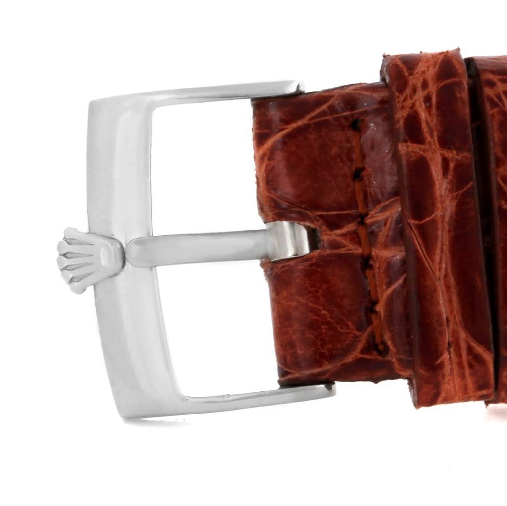 The image shows a close-up of the buckle and leather strap of a Rolex Cellini 4233 Men's White Gold Black Dial 4233 Men's White Gold Black Dial watch.