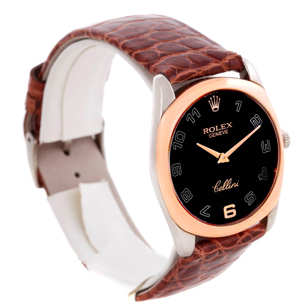 The Rolex Cellini 4233 Men's White Gold Black Dial 4233 Men's White Gold Black Dial watch is shown at a slight angle, highlighting the black dial, rose gold bezel, and brown leather strap.