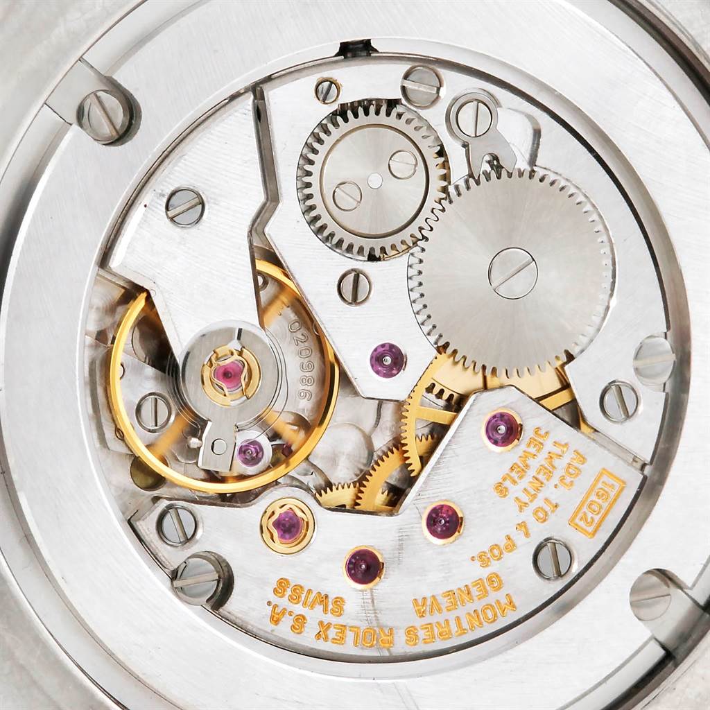 The image shows a close-up of the inner mechanics and movement parts of a Rolex Cellini 4233 Men's White Gold Black Dial 4233 Men's White Gold Black Dial watch.