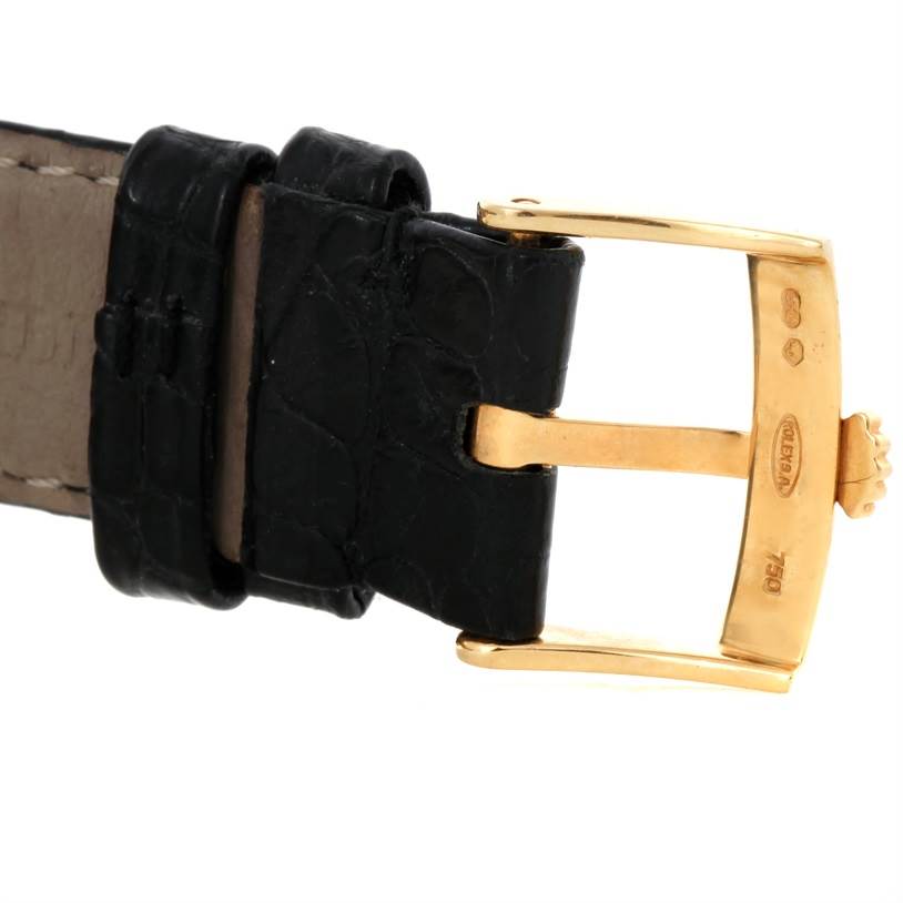 The image shows a close-up of the buckle and leather strap of a Rolex Cellini 5115 Men's Yellow Gold Black Dial 5115 Men's Yellow Gold Black Dial watch.