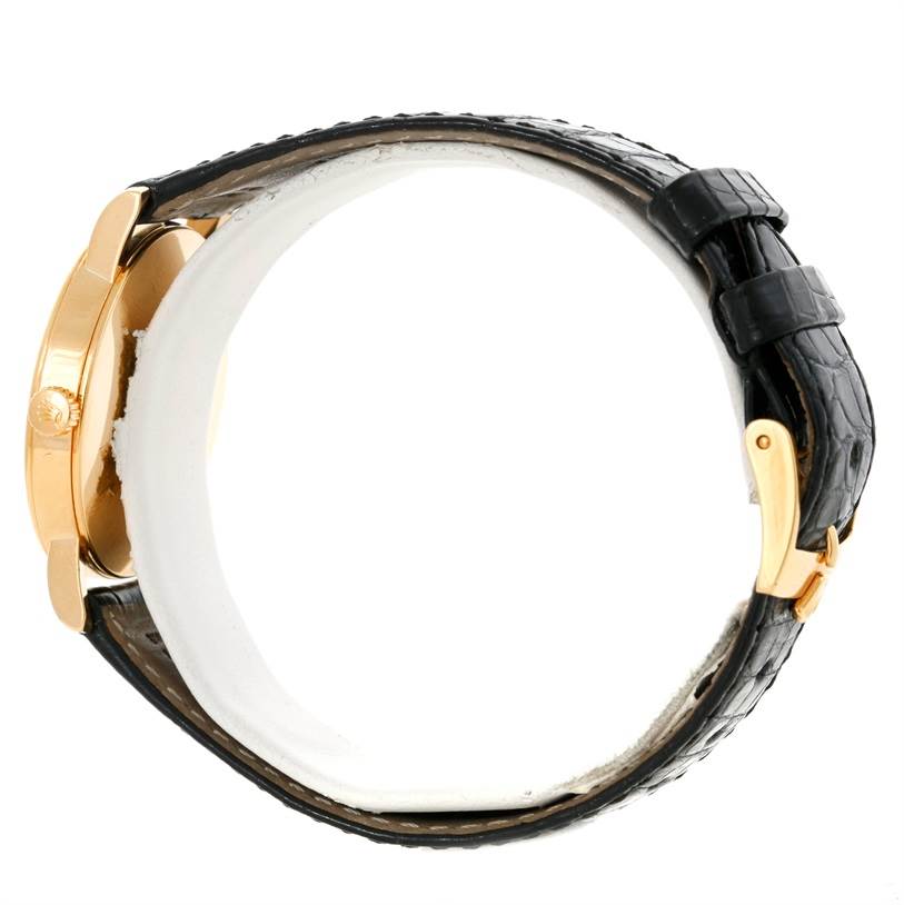 The image shows the side profile of the Rolex Cellini 5115 Men's Yellow Gold Black Dial 5115 Men's Yellow Gold Black Dial watch, highlighting its case, crown, and leather strap with a buckle.