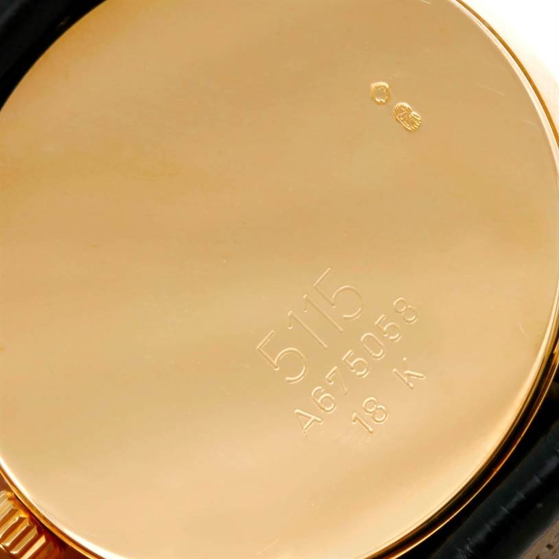 This image shows the back case of the Rolex Cellini 5115 Men's Yellow Gold Black Dial 5115 Men's Yellow Gold Black Dial model watch, highlighting the engravings.