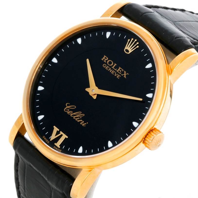 The image shows a close-up view of the Rolex Cellini 5115 Men's Yellow Gold Black Dial 5115 Men's Yellow Gold Black Dial watch face and crown, angled slightly from the front and side.