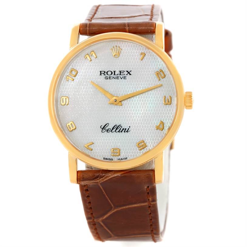 This Rolex Cellini 5115 Men
s Yellow Gold Mother of Pearl Dial 5115 Men
s Yellow Gold Mother of Pearl Dial watch is shown from a front angle, displaying its dial, gold case, and brown leather strap.