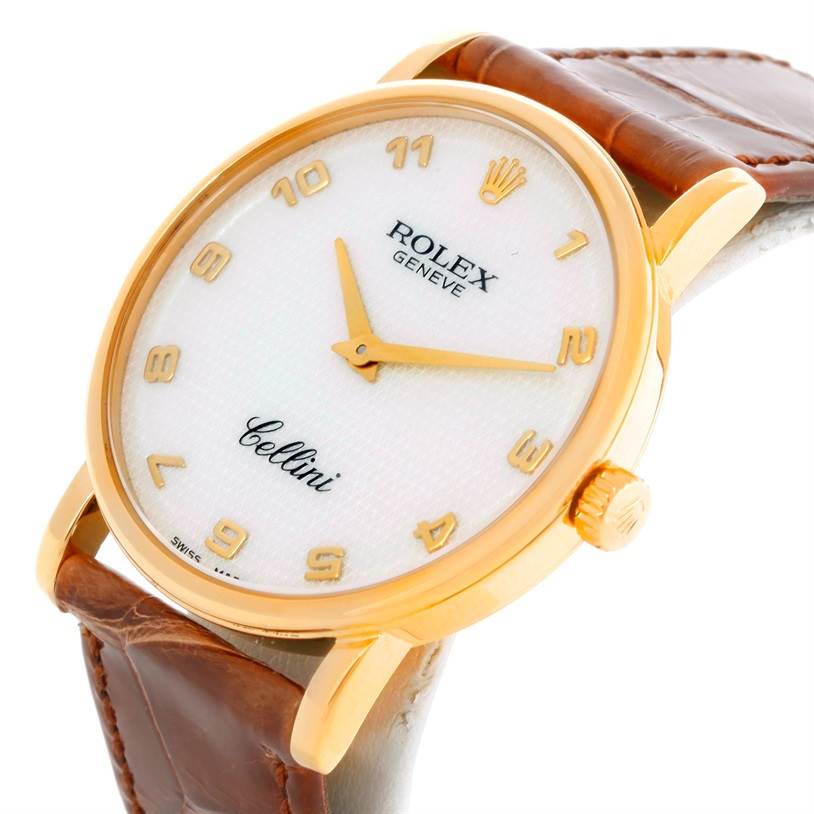 This image shows a Rolex Cellini 5115 Men
s Yellow Gold Mother of Pearl Dial 5115 Men
s Yellow Gold Mother of Pearl Dial watch at an angled view highlighting the face, gold case, crown, and brown leather strap.