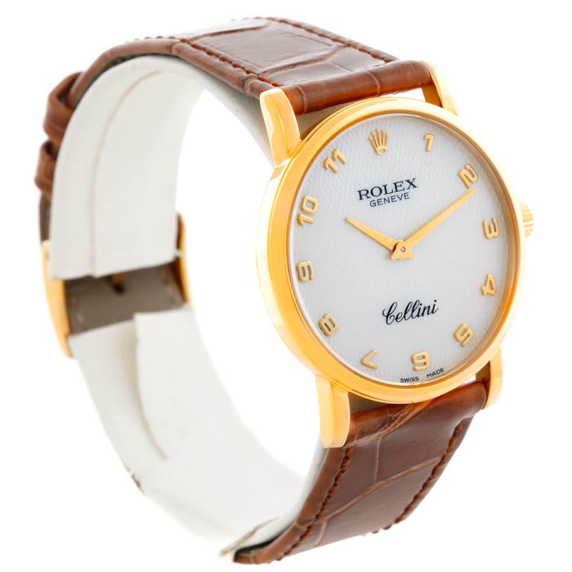 The Rolex Cellini 5115 Men
s Yellow Gold Mother of Pearl Dial 5115 Men
s Yellow Gold Mother of Pearl Dial watch is shown at a slight angle, highlighting the face, bezel, and brown leather strap.