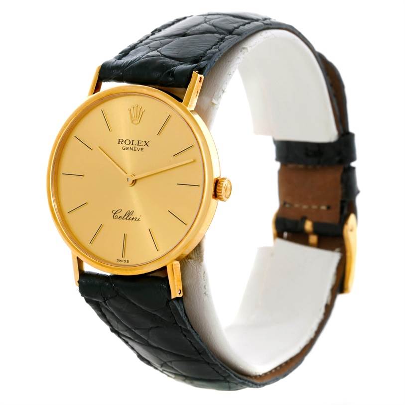 The Rolex Cellini 5112 Men
s Yellow Gold Champagne Dial 5112 Men
s Yellow Gold Champagne Dial watch is shown at a three-quarter angle, displaying the face, crown, leather strap, and buckle.